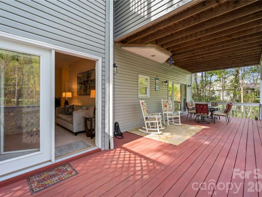 483 Heather Marie Drive, Hendersonville, NC 28792.  MLS# CAR4367948, YatesRealty ID 20764. Large back deck on basement level