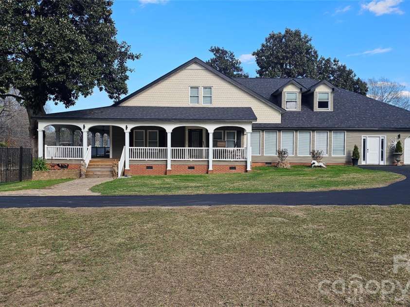 1310 Main Street, Locust, NC 28097.  MLS# CAR4360987, YatesRealty ID 20766. 