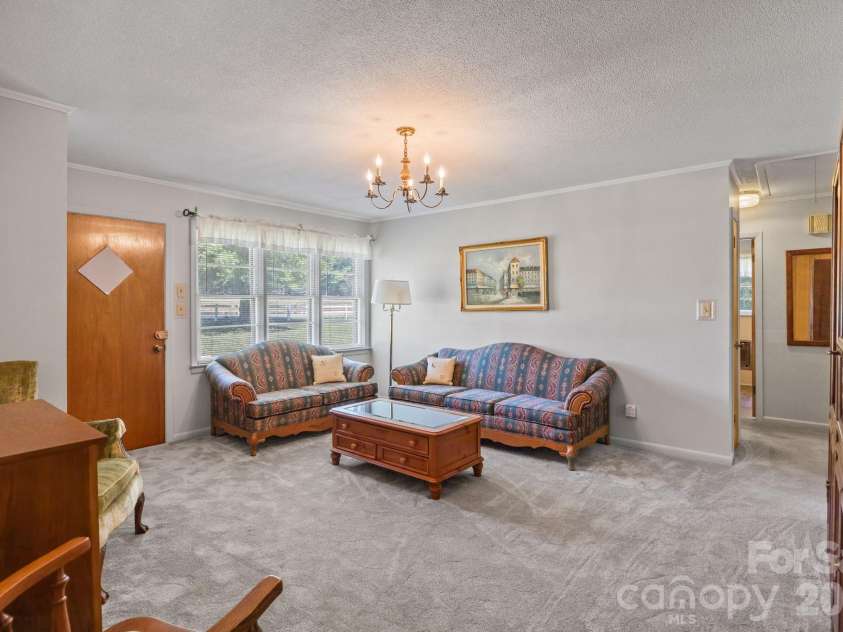 4000 Mount Pleasant Road, Sherrills Ford, NC 28673.  MLS# CAR4372224, YatesRealty ID 20769. Living room from dining/flex space