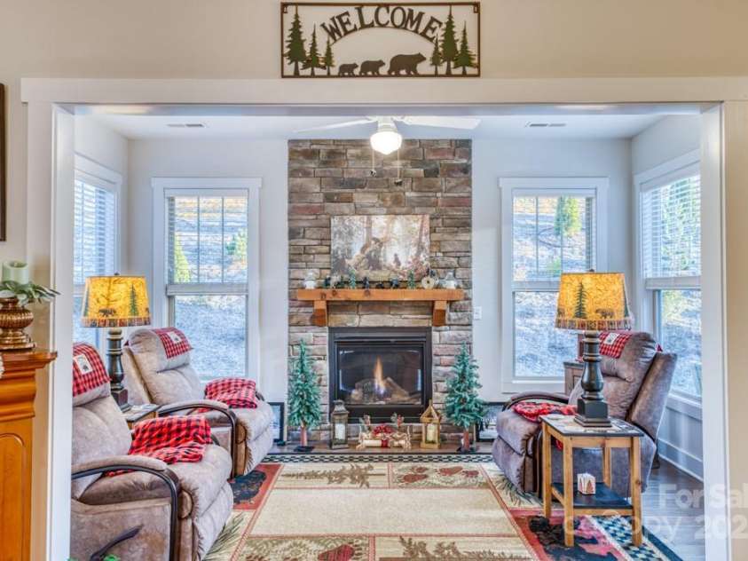 153 Water Leaf Drive, Weaverville, NC 28787.  MLS# CAR4260555, YatesRealty ID 20771. Den with Gas Fireplace