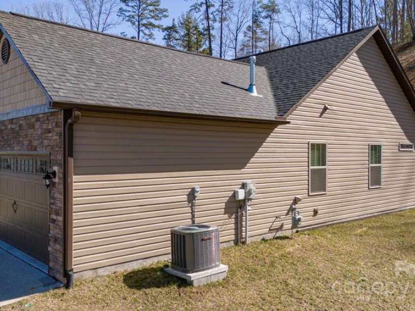 153 Water Leaf Drive, Weaverville, NC 28787.  MLS# CAR4260555, YatesRealty ID 20771. Side of House