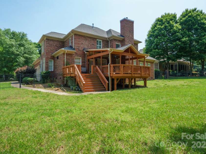 100 Woodwinds Drive, Mount Holly, NC 28120.  MLS# CAR4261214, YatesRealty ID 20775. Back of House