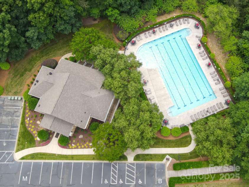 100 Woodwinds Drive, Mount Holly, NC 28120.  MLS# CAR4261214, YatesRealty ID 20775. Community Club House pool