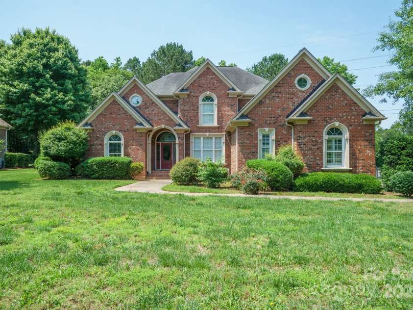 100 Woodwinds Drive, Mount Holly, NC 28120.  MLS# CAR4261214, YatesRealty ID 20775. House front