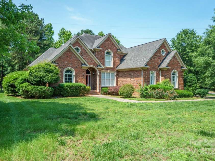 100 Woodwinds Drive, Mount Holly, NC 28120.  MLS# CAR4261214, YatesRealty ID 20775. House front