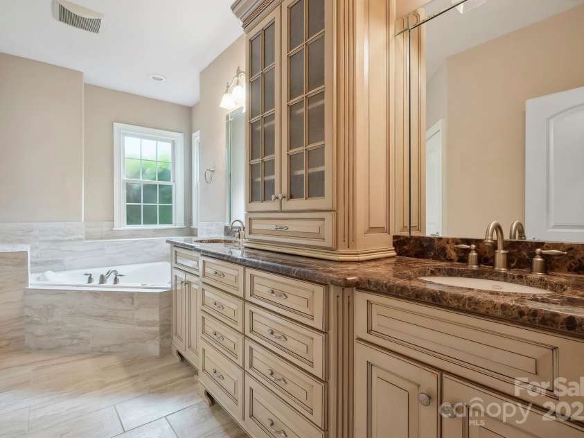 100 Woodwinds Drive, Mount Holly, NC 28120.  MLS# CAR4261214, YatesRealty ID 20775. Primary Bathroom