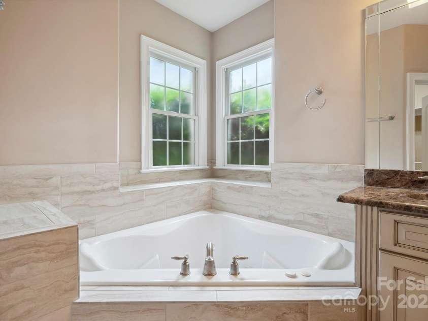 100 Woodwinds Drive, Mount Holly, NC 28120.  MLS# CAR4261214, YatesRealty ID 20775. Primary Bathroom