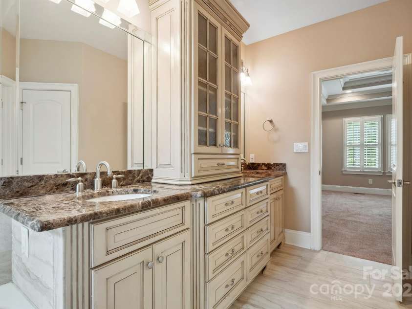 100 Woodwinds Drive, Mount Holly, NC 28120.  MLS# CAR4261214, YatesRealty ID 20775. Primary Bathroom