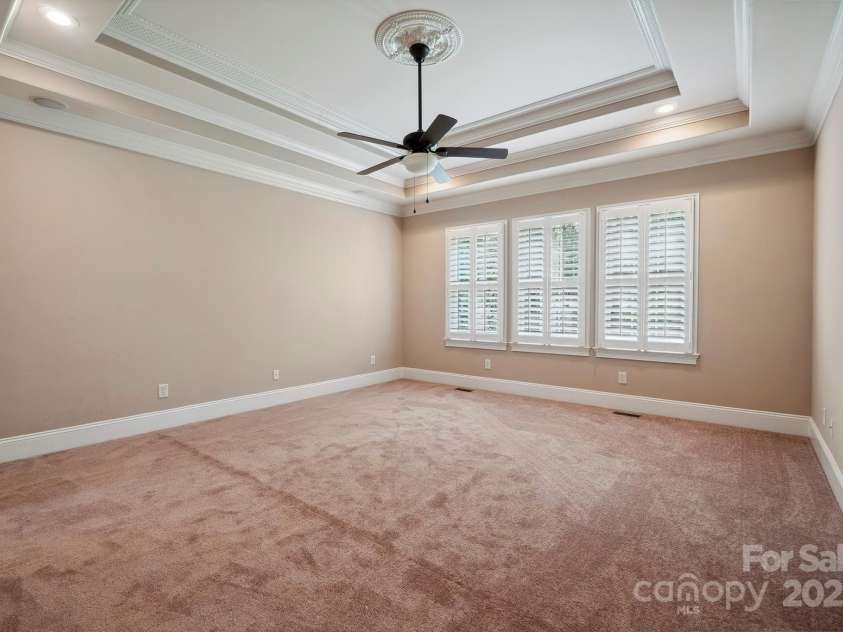 100 Woodwinds Drive, Mount Holly, NC 28120.  MLS# CAR4261214, YatesRealty ID 20775. Primary Bedroom - main level