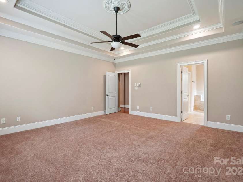 100 Woodwinds Drive, Mount Holly, NC 28120.  MLS# CAR4261214, YatesRealty ID 20775. Primary Bedroom - main level