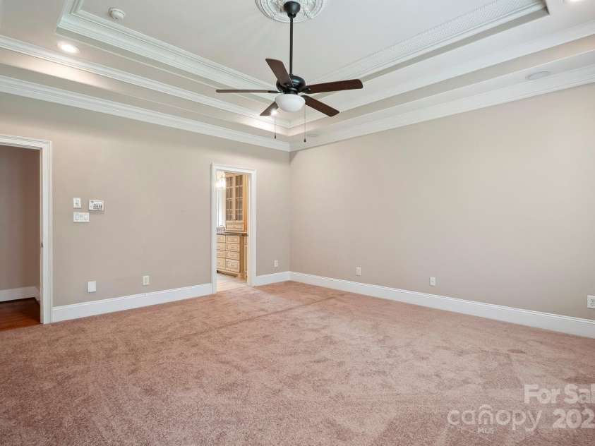 100 Woodwinds Drive, Mount Holly, NC 28120.  MLS# CAR4261214, YatesRealty ID 20775. Primary Bedroom - main level