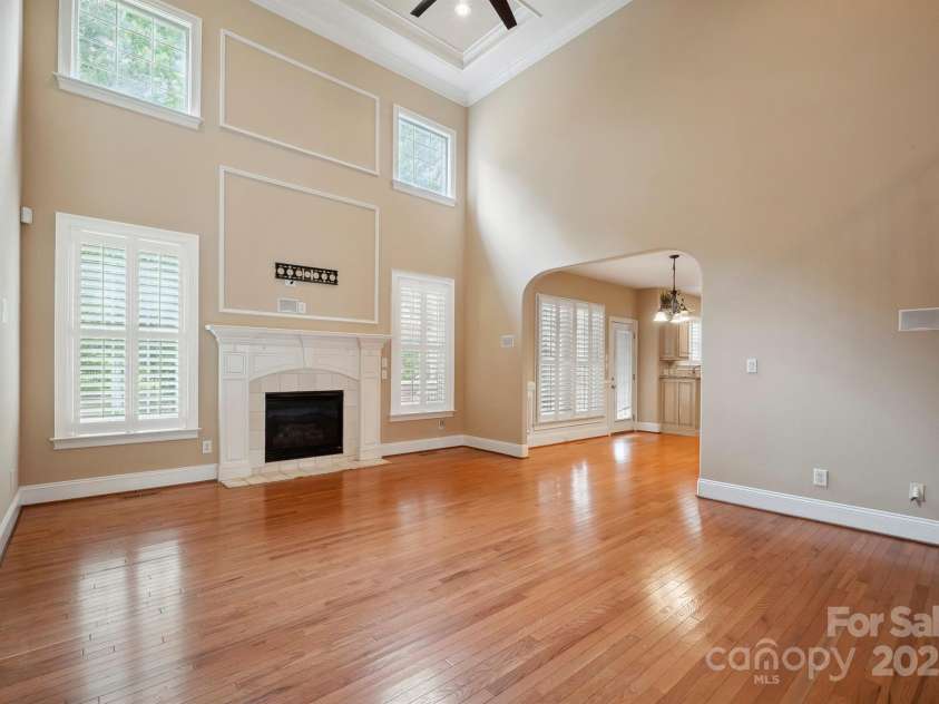 100 Woodwinds Drive, Mount Holly, NC 28120.  MLS# CAR4261214, YatesRealty ID 20775. Two Story Great Room