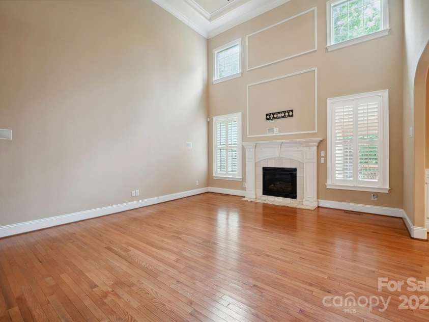 100 Woodwinds Drive, Mount Holly, NC 28120.  MLS# CAR4261214, YatesRealty ID 20775. Two Story Great Room