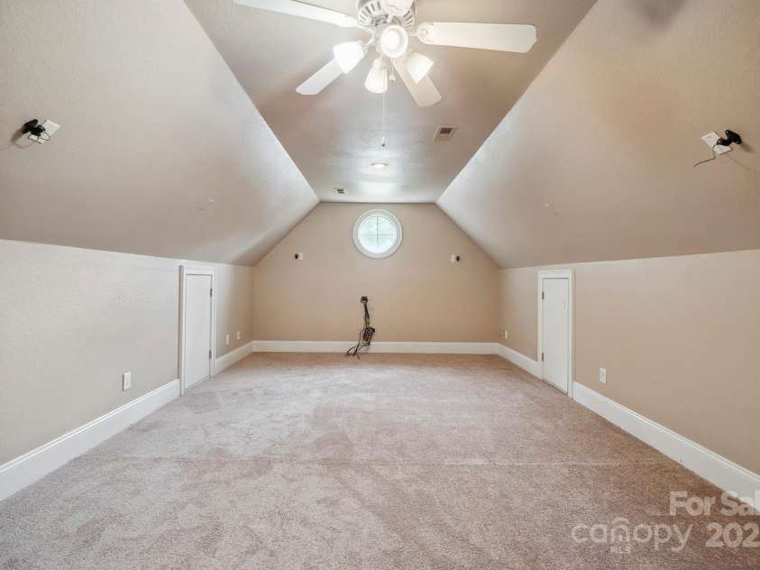 100 Woodwinds Drive, Mount Holly, NC 28120.  MLS# CAR4261214, YatesRealty ID 20775. Upper level Bonus Room