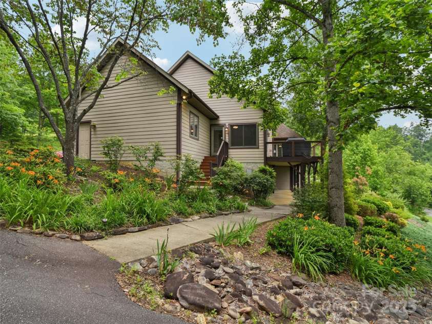 142 Twin Courts Drive, Weaverville, NC 28787.  MLS# CAR4222698, YatesRealty ID 20779. Entrances on two levels