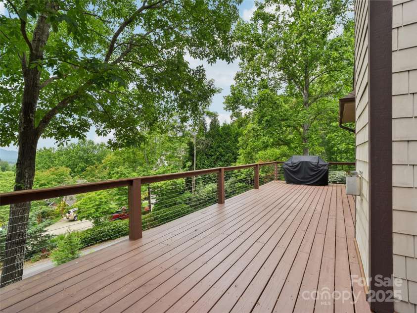 142 Twin Courts Drive, Weaverville, NC 28787.  MLS# CAR4222698, YatesRealty ID 20779. Expanded new deck