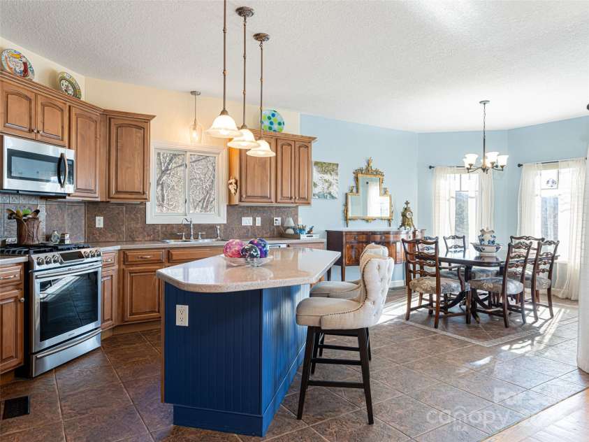 142 Twin Courts Drive, Weaverville, NC 28787.  MLS# CAR4222698, YatesRealty ID 20779. Large island and open plan for great flow