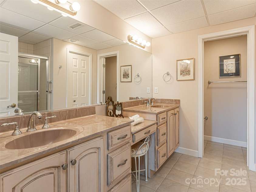 142 Twin Courts Drive, Weaverville, NC 28787.  MLS# CAR4222698, YatesRealty ID 20779. Lower level bathroom
