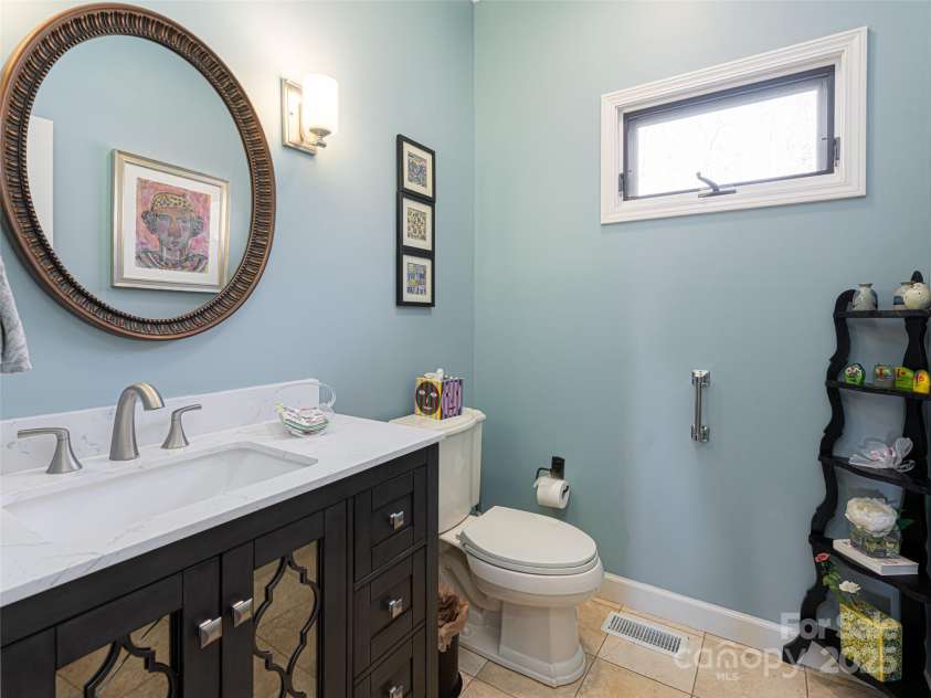142 Twin Courts Drive, Weaverville, NC 28787.  MLS# CAR4222698, YatesRealty ID 20779. Main floor powder room