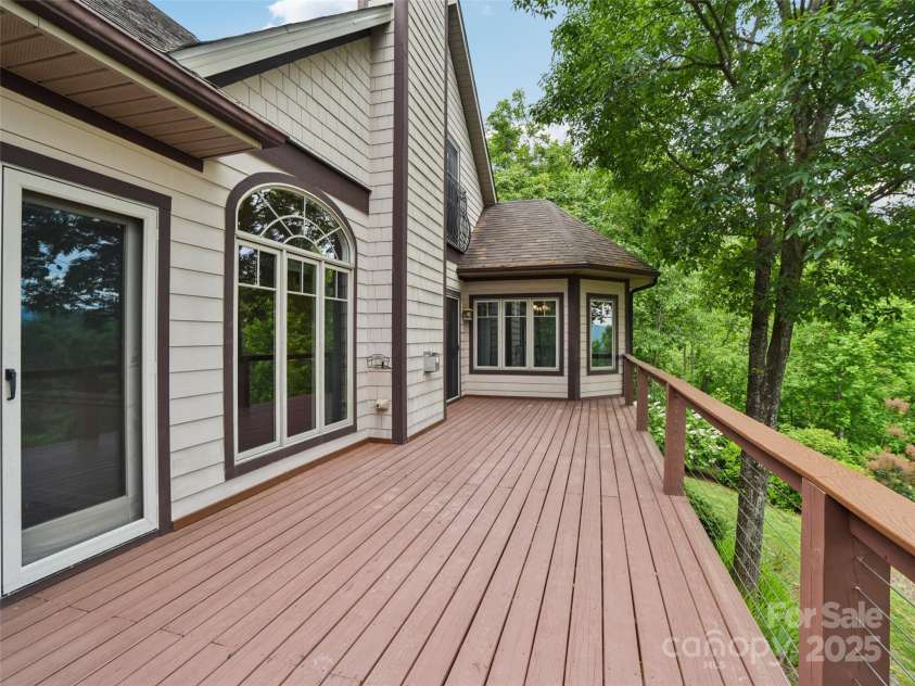 142 Twin Courts Drive, Weaverville, NC 28787.  MLS# CAR4222698, YatesRealty ID 20779. You can have a party on this deck!
