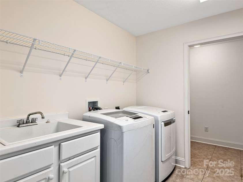 354 Summerfield Place, Flat Rock, NC 28731.  MLS# CAR4165363, YatesRealty ID 2078. Laundry Room - Washer and Dryer convey