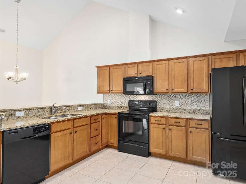 354 Summerfield Place, Flat Rock, NC 28731.  MLS# CAR4165363, YatesRealty ID 2078. Spacious Kitchen with Granite counters