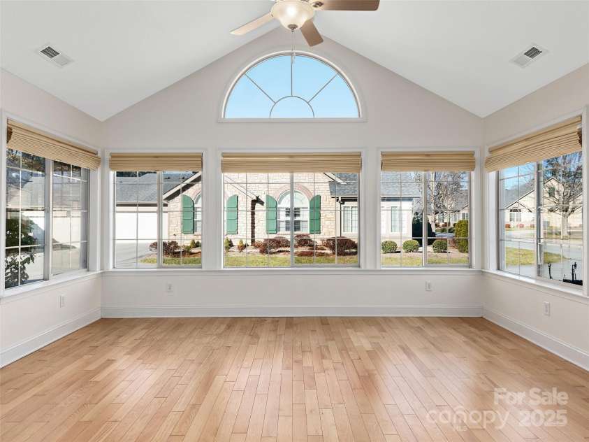 354 Summerfield Place, Flat Rock, NC 28731.  MLS# CAR4165363, YatesRealty ID 2078. Tons of natural light from the spacious sunroom