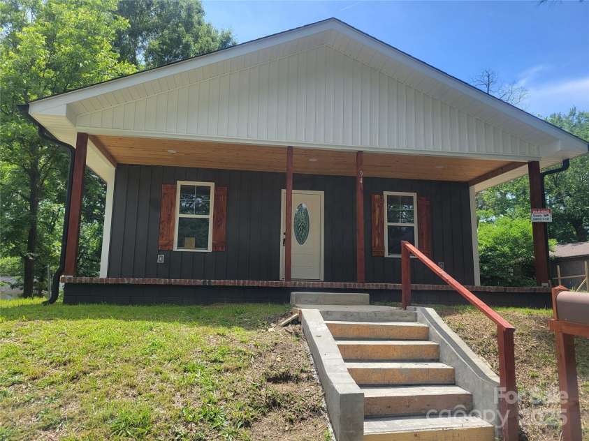 94 James Street, Concord, NC 28025.  MLS# CAR4271265, YatesRealty ID 20782. Front of home with steps leading up to front porch