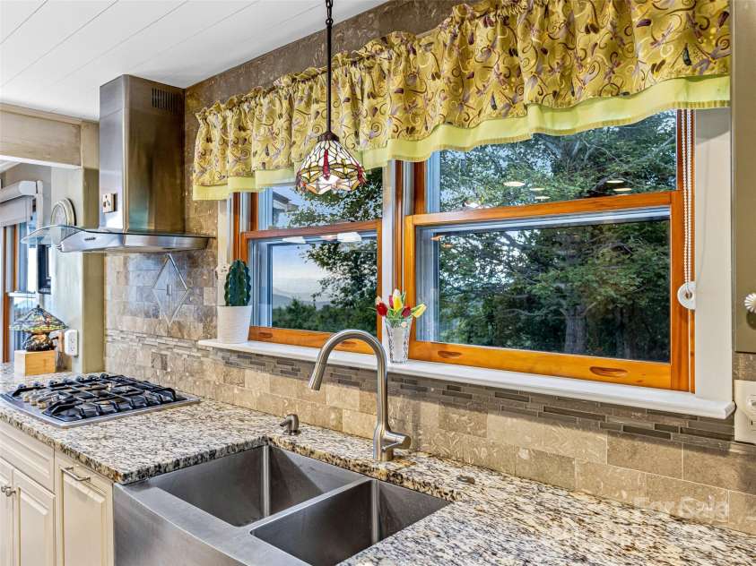 4575 Bearwallow Mountain Road, Hendersonville, NC 28792.  MLS# CAR4264671, YatesRealty ID 20785. 