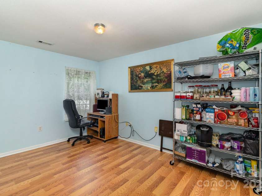 10816 Pointer Ridge Drive, Charlotte, NC 28214.  MLS# CAR4267321, YatesRealty ID 20787. Flex room on main floor