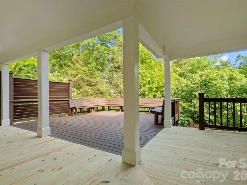 602 Main Street, Davidson, NC 28036.  MLS# CAR4376651, YatesRealty ID 20788. Expansive deck, freshly stained and with replacement wood
