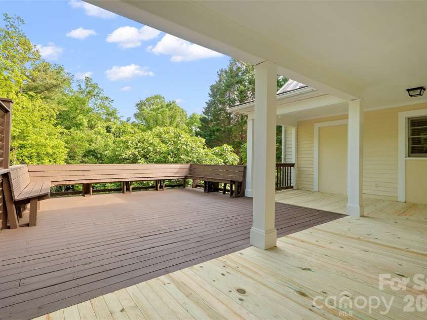 602 Main Street, Davidson, NC 28036.  MLS# CAR4376651, YatesRealty ID 20788. Expansive deck, freshly stained and with replacement wood
