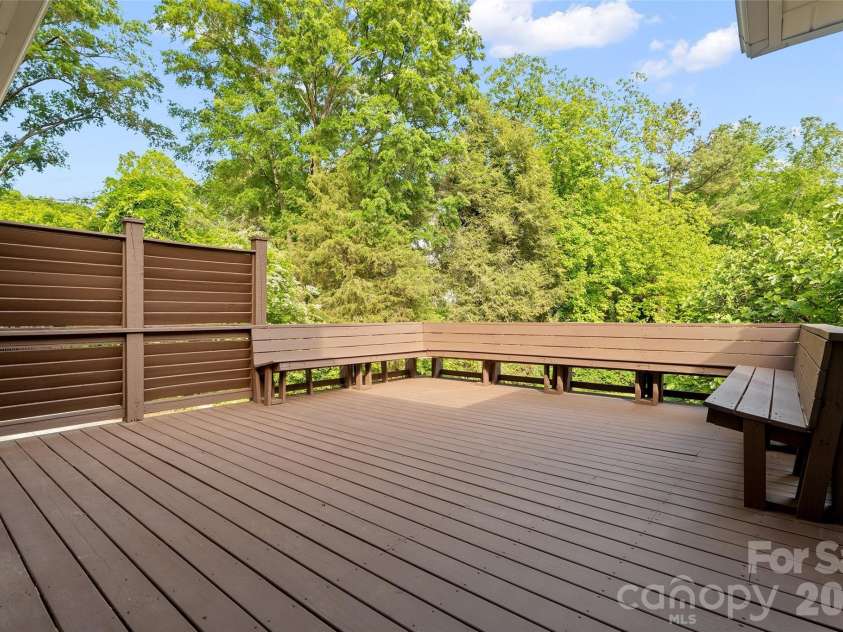 602 Main Street, Davidson, NC 28036.  MLS# CAR4376651, YatesRealty ID 20788. Expansive deck, freshly stained and with replacement wood