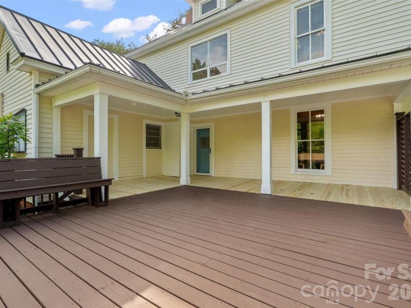 602 Main Street, Davidson, NC 28036.  MLS# CAR4376651, YatesRealty ID 20788. Expansive deck, freshly stained and with replacement wood