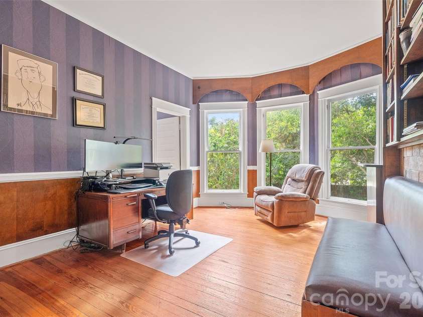 602 Main Street, Davidson, NC 28036.  MLS# CAR4376651, YatesRealty ID 20788. The main-level primary suite includes an ensuite bath and an attached true study.  An expansion of the primary bedroom into the adjoining study is well within the realm of possibility.