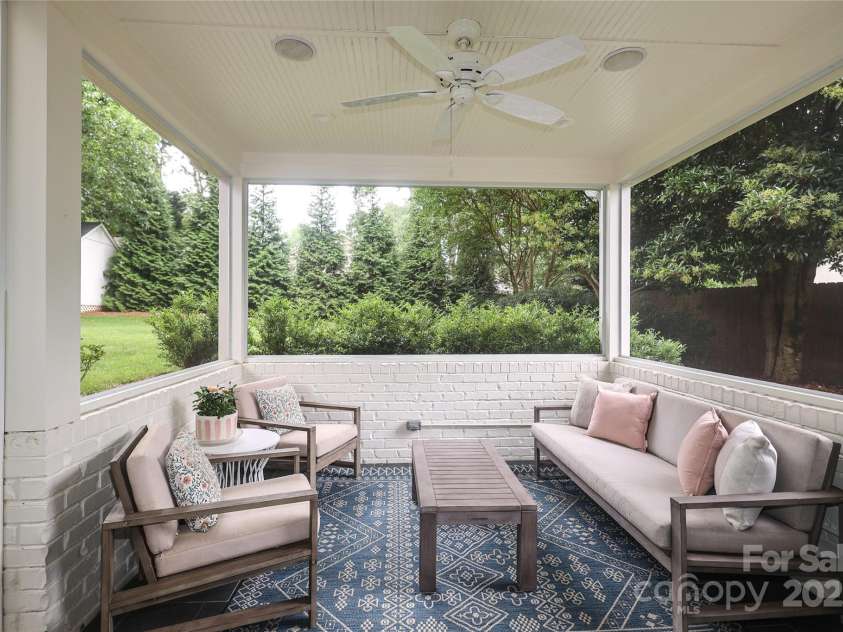 4126 Tyndale Avenue, Charlotte, NC 28210.  MLS# CAR4268563, YatesRealty ID 20792. Beautiful screened porch overlooking the large flat backyard