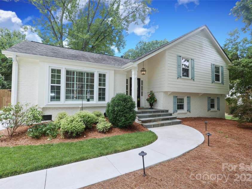 4126 Tyndale Avenue, Charlotte, NC 28210.  MLS# CAR4268563, YatesRealty ID 20792. Charming and updated exterior with Benjamin Moore 