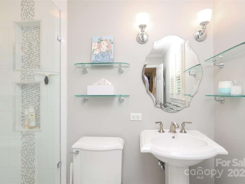 4126 Tyndale Avenue, Charlotte, NC 28210.  MLS# CAR4268563, YatesRealty ID 20792. En suite bath with walk in shower