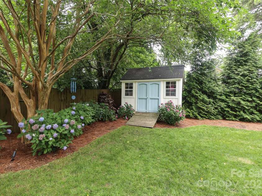 4126 Tyndale Avenue, Charlotte, NC 28210.  MLS# CAR4268563, YatesRealty ID 20792. Garden shed perfect for storage