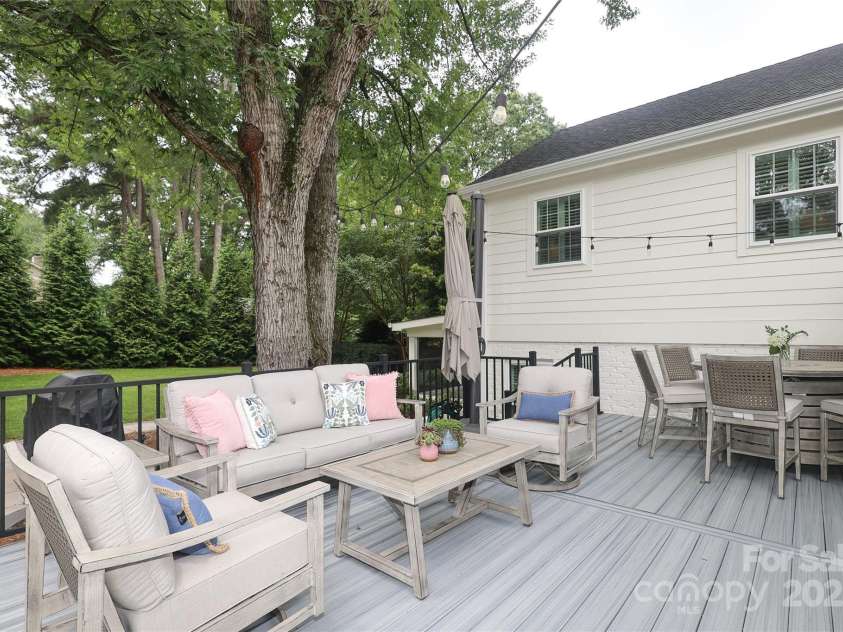 4126 Tyndale Avenue, Charlotte, NC 28210.  MLS# CAR4268563, YatesRealty ID 20792. Large trek deck for dining and seating