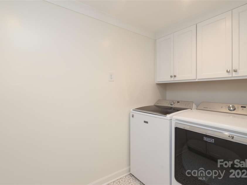 4126 Tyndale Avenue, Charlotte, NC 28210.  MLS# CAR4268563, YatesRealty ID 20792. Laundry room with laundry sink and chute from the upper floor