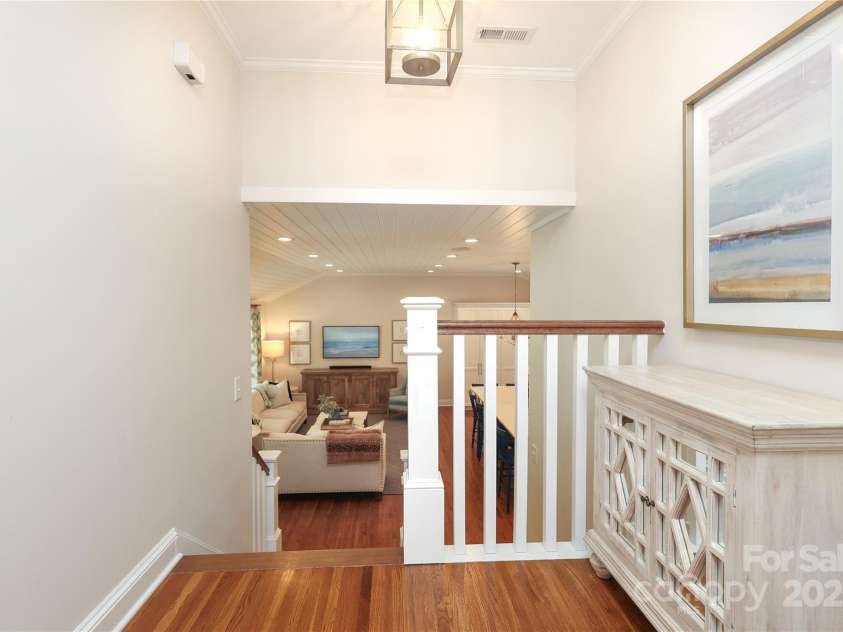 4126 Tyndale Avenue, Charlotte, NC 28210.  MLS# CAR4268563, YatesRealty ID 20792. Second floor stair landing view to the first floor
