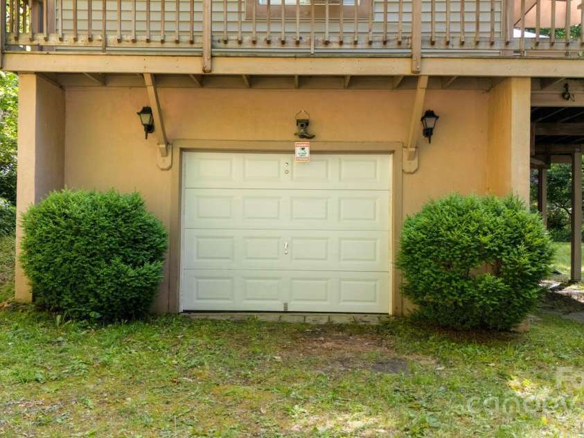 80 Laurel Canyon Road, Franklin, NC 28734.  MLS# CAR4270579, YatesRealty ID 20799. Attached 1 Car Garage with Workshop Area