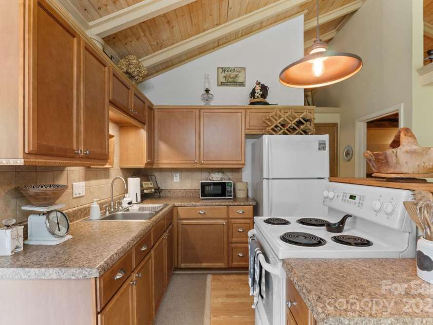 80 Laurel Canyon Road, Franklin, NC 28734.  MLS# CAR4270579, YatesRealty ID 20799. Kitchen/Dining/Living Room - Open Floor Plan
