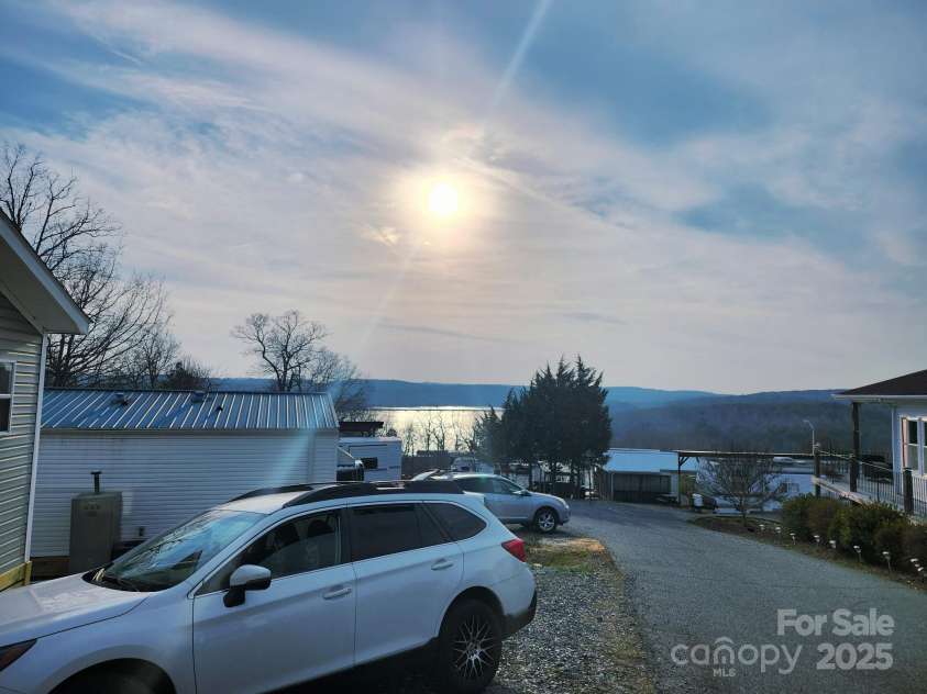 166 Eagle Drive, New London, NC 28127.  MLS# CAR4271205, YatesRealty ID 20800. Aww the Sunsets !