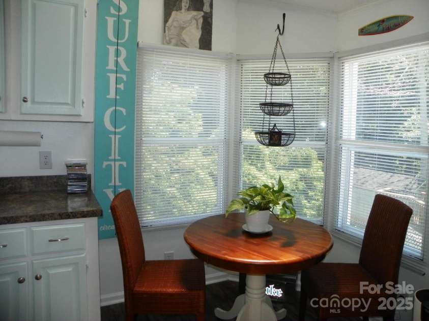 166 Eagle Drive, New London, NC 28127.  MLS# CAR4271205, YatesRealty ID 20800. Dining area with lots of natural lighting!