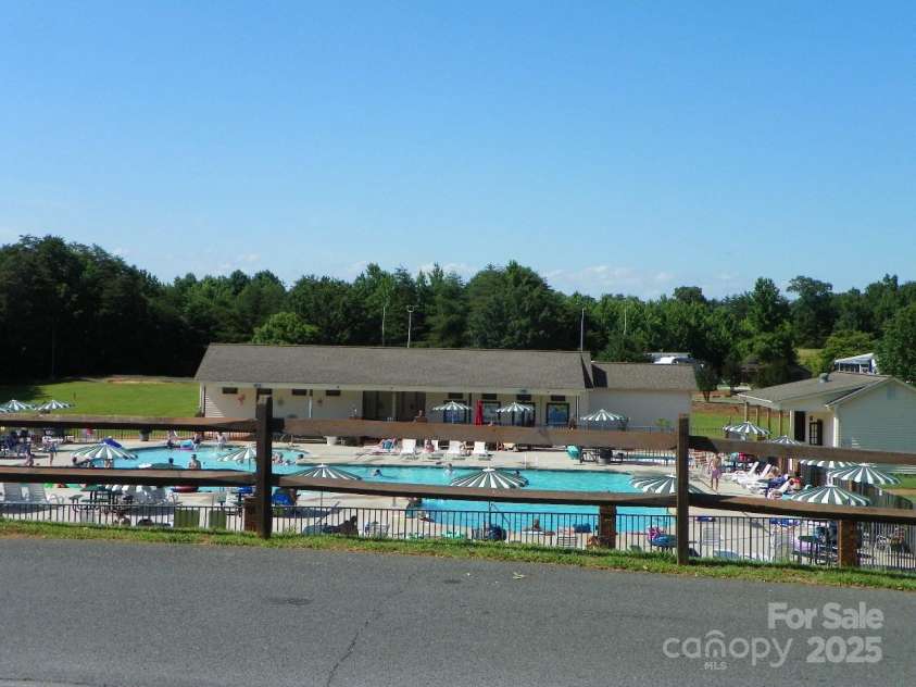 166 Eagle Drive, New London, NC 28127.  MLS# CAR4271205, YatesRealty ID 20800. Great amenities  Pool