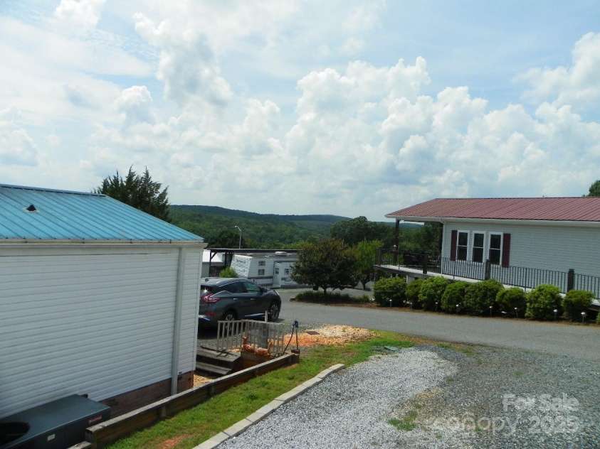 166 Eagle Drive, New London, NC 28127.  MLS# CAR4271205, YatesRealty ID 20800. Relaxing Mountain View!!