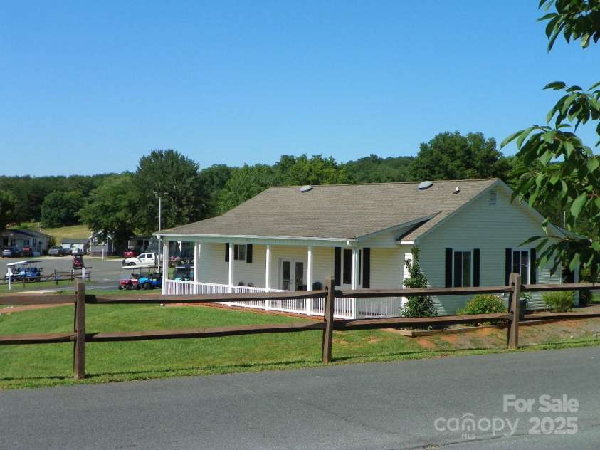 166 Eagle Drive, New London, NC 28127.  MLS# CAR4271205, YatesRealty ID 20800. Work out center