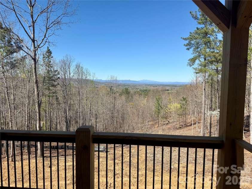 500 Grandview Peaks Drive, Nebo, NC 28761.  MLS# CAR4364035, YatesRealty ID 20800. Long-Range Views from Back Porch